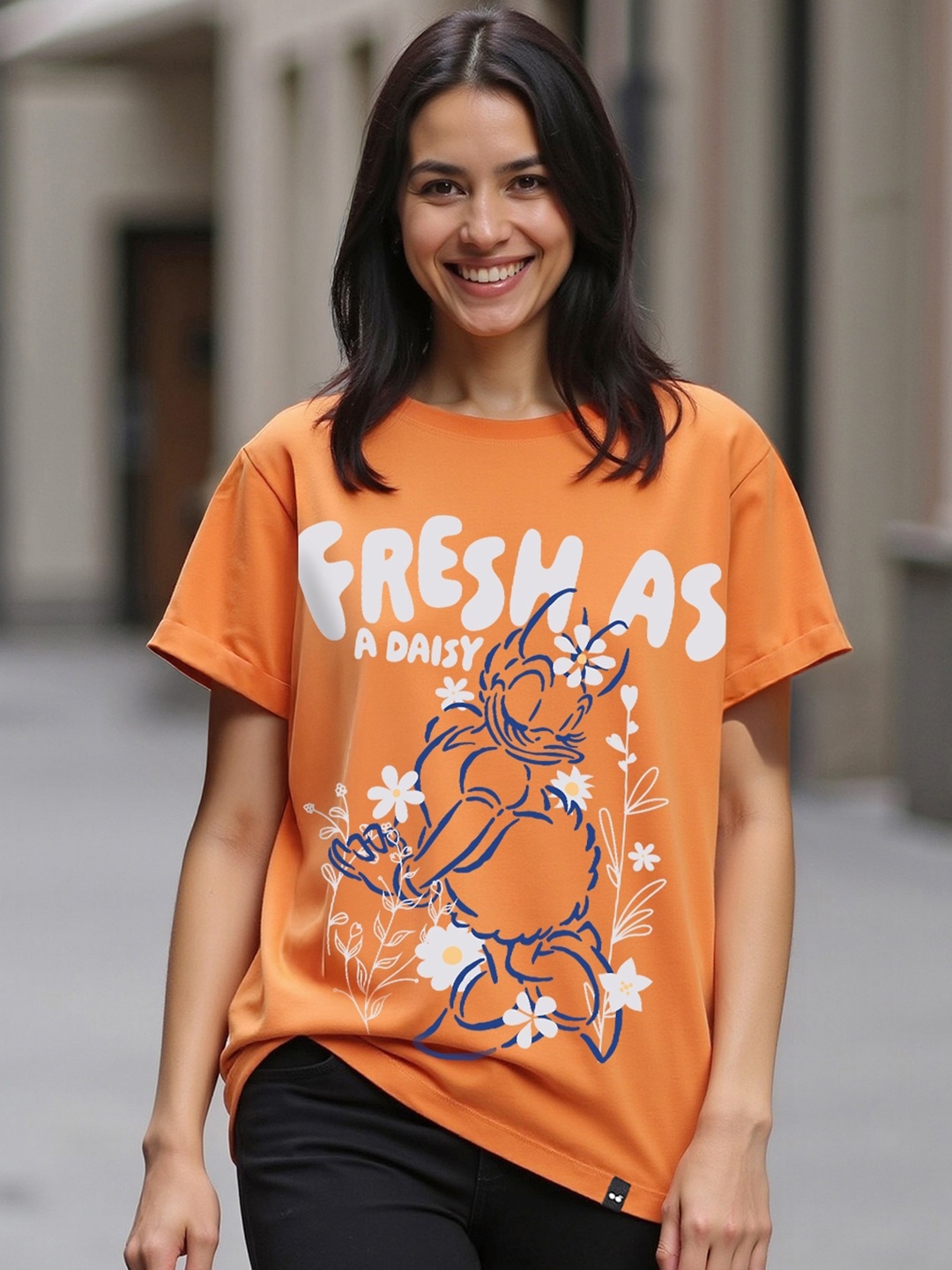 

Bewakoof Women Disney Graphic Printed Round Neck Cotton Relaxed Fit T-shirt, Orange