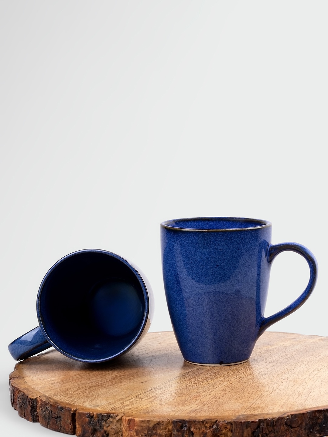 

Storepedia Blue Handcrafted Solid Ceramic Glossy Mugs Set of Cups and Mugs