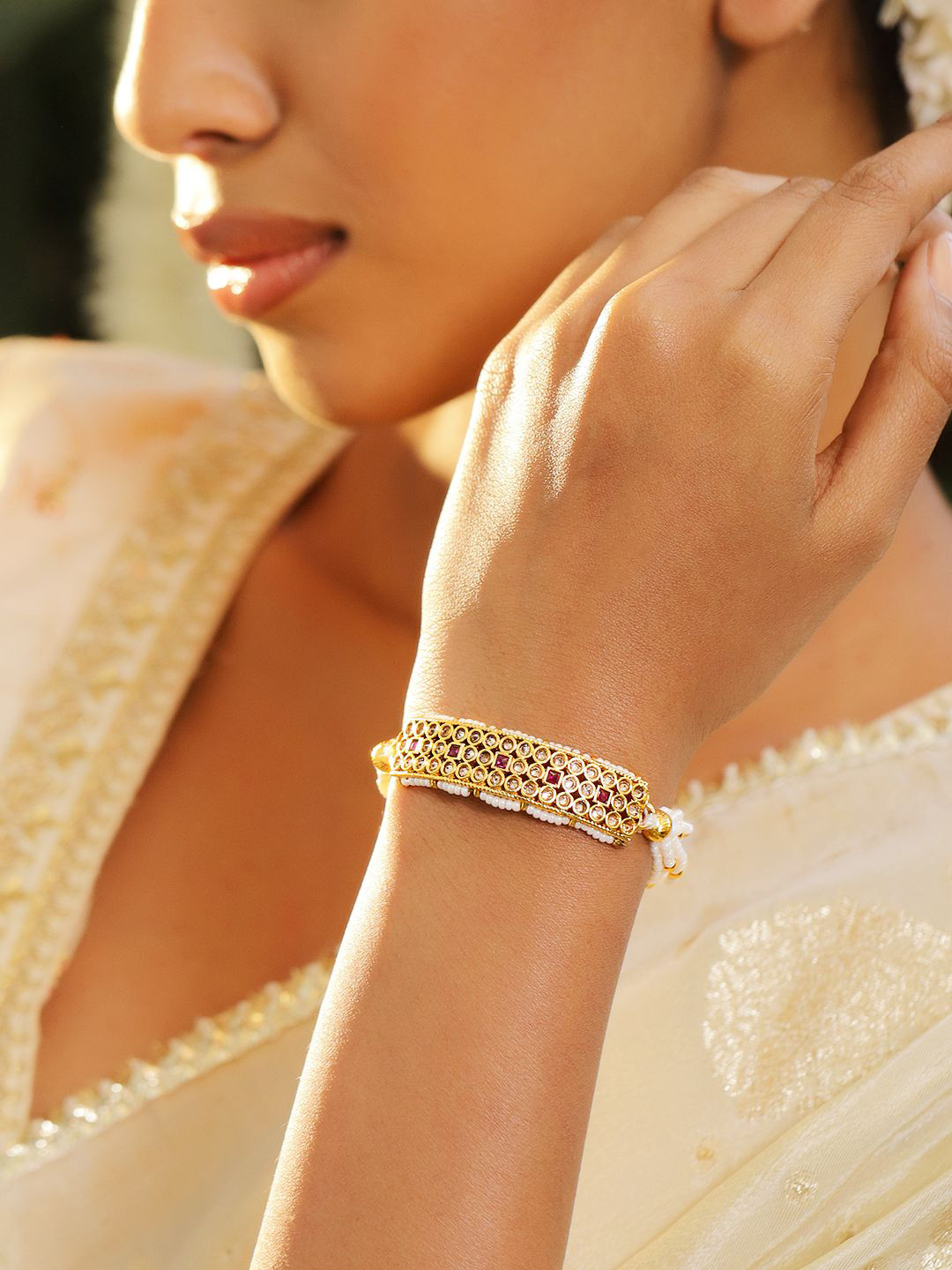 

Rubans 22K Gold Plated Kundan & Ruby Studded Pearls Beaded Traditional Bracelet
