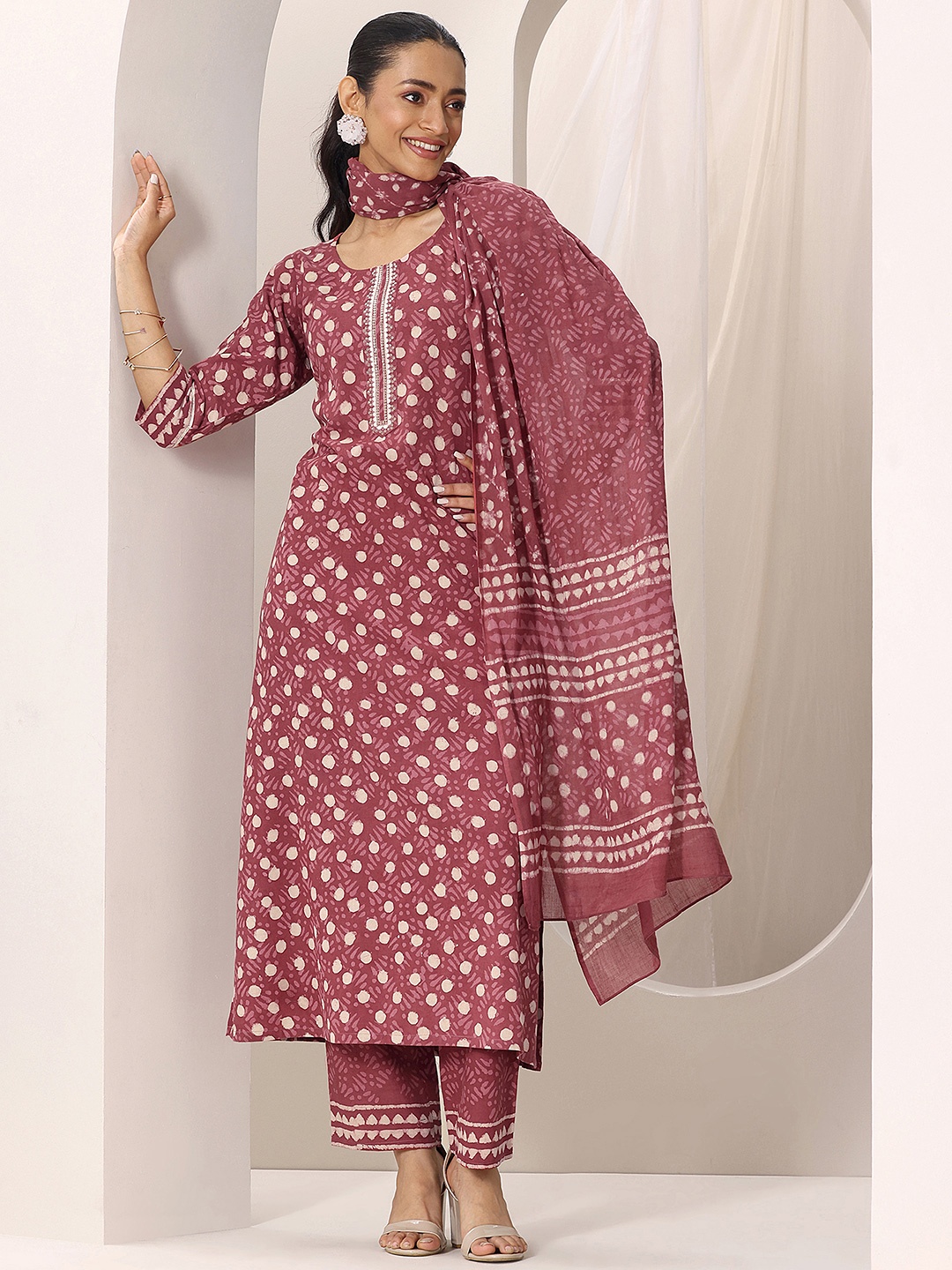 

Libas geometric Printed Round Neck Kurta With Trousers And Dupatta, Rust