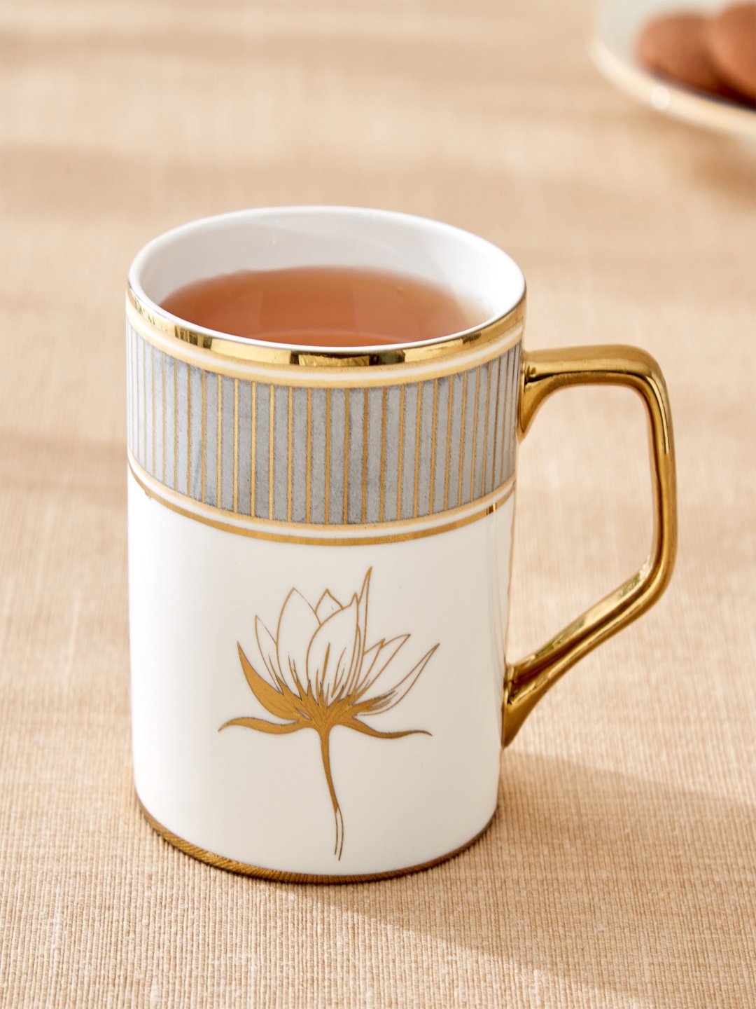 

Home Centre Gold-Toned & Grey Printed Bone China Glossy Mugs Set of Cups and Mugs