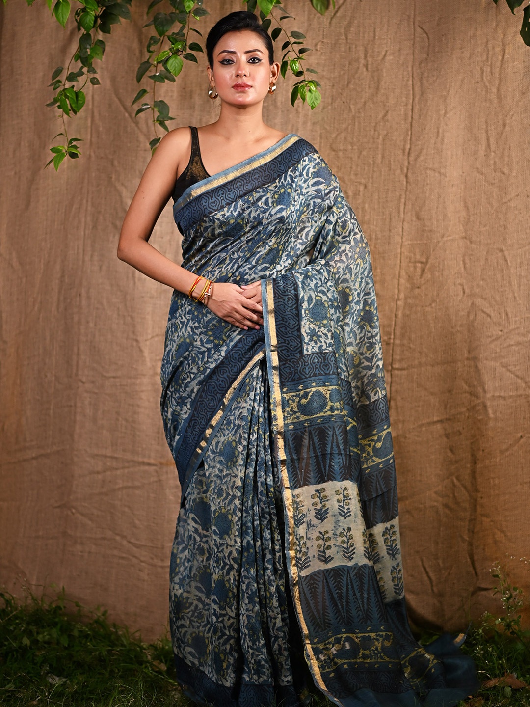 

Unnati Silks Women Floral Printed Zari Chanderi Saree, Blue