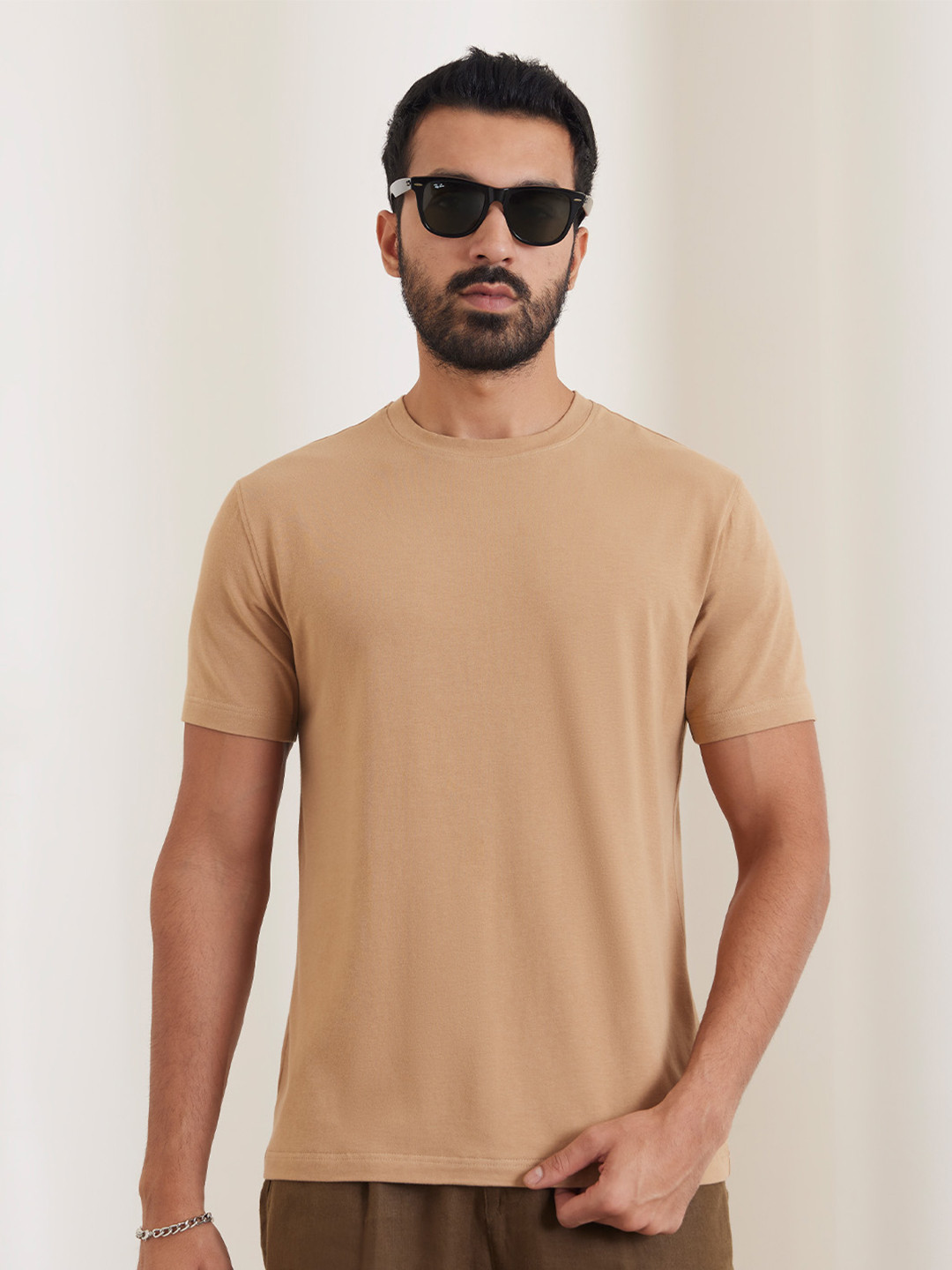 

Bombay Shirt Company Men Solid Round Neck T-shirt, Brown