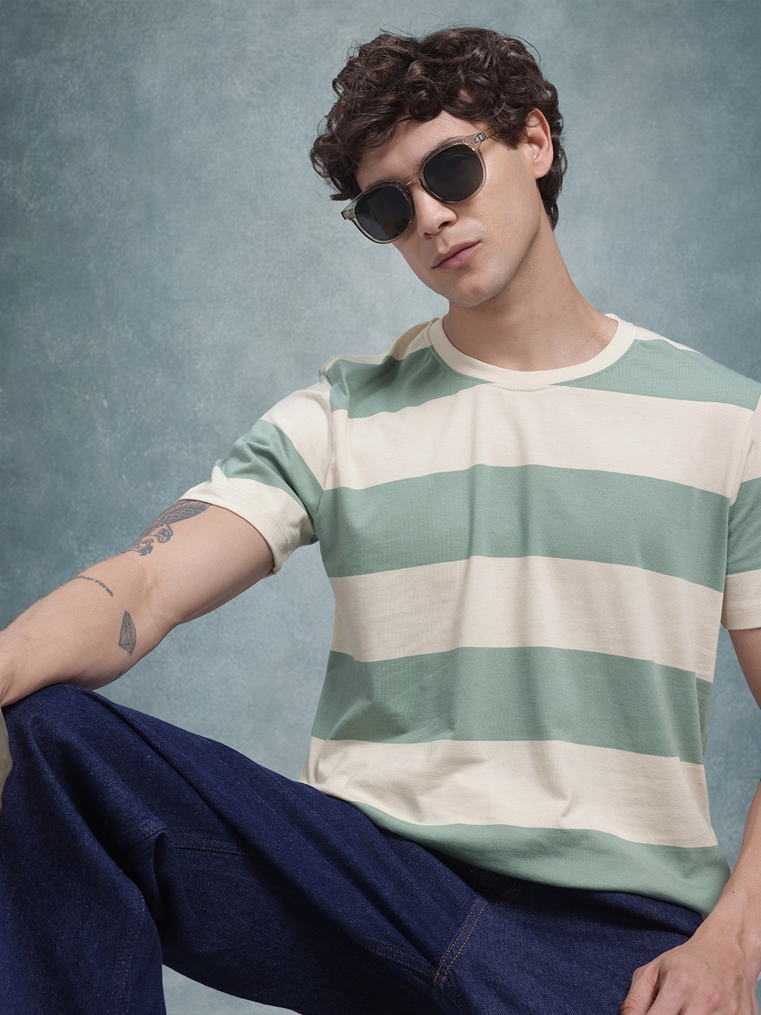 

Roadster Men Striped T-shirt, Green