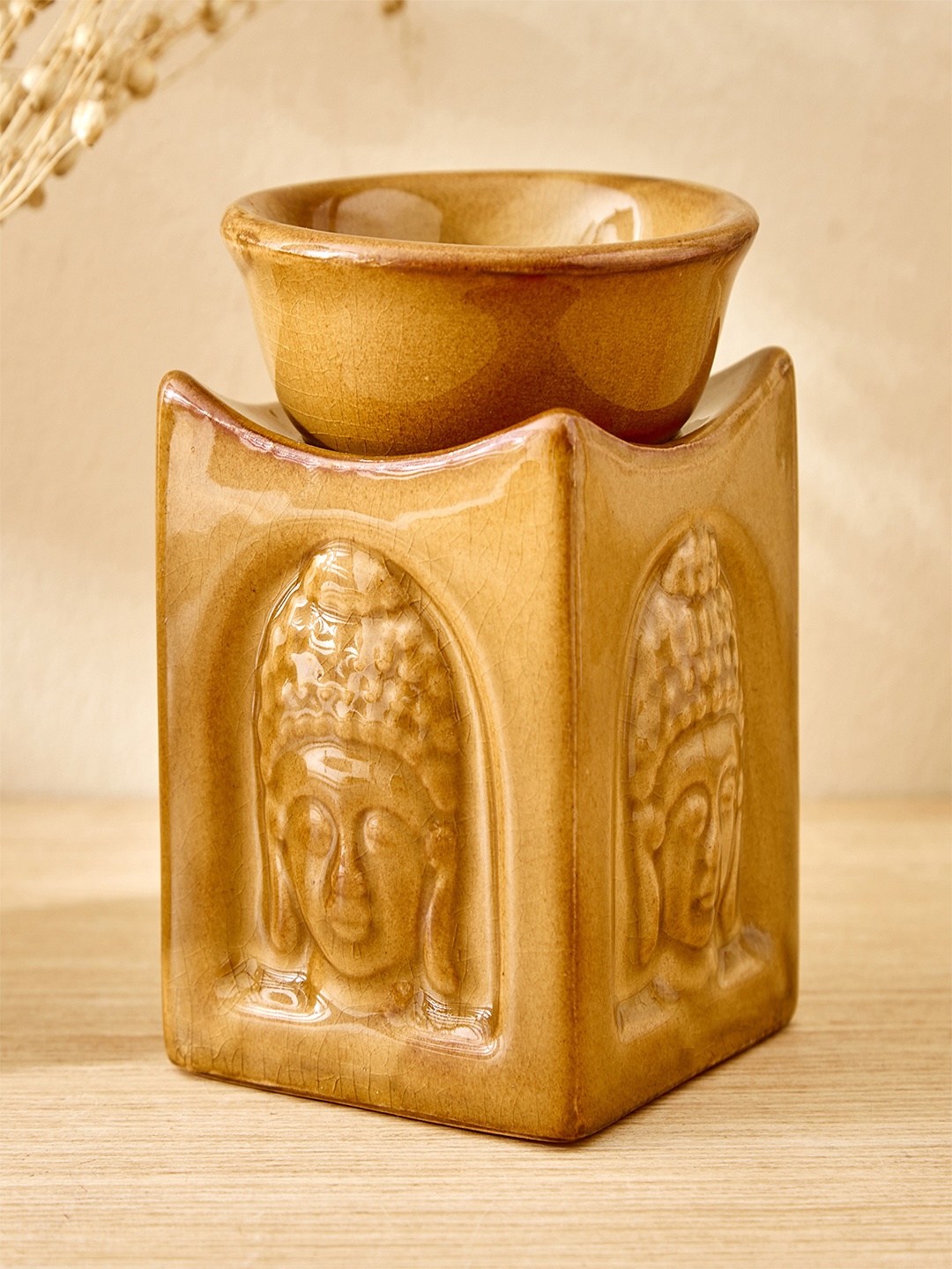 

Home Centre Yellow Glossy Divine Buddha Ceramic Aroma Oil Diffuser