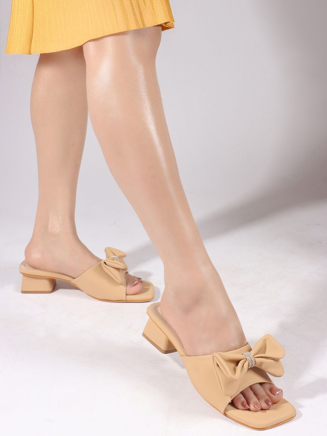 

Lavie Women Block Heel Sandals with Bows, Beige