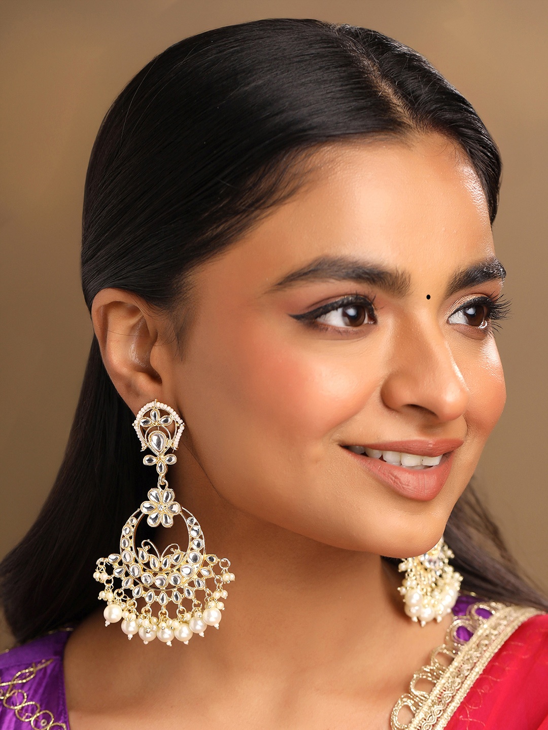 

Yellow Chimes Gold-Plated Kundan Crescent Shaped Chandbalis Earrings Pearl Danglers