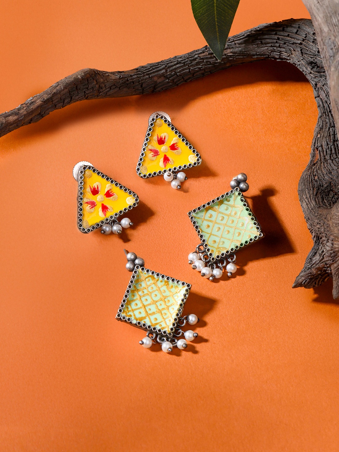 

Yellow Chimes Set Of 2 Stud & Oxidised Silver Meenakari Earrings