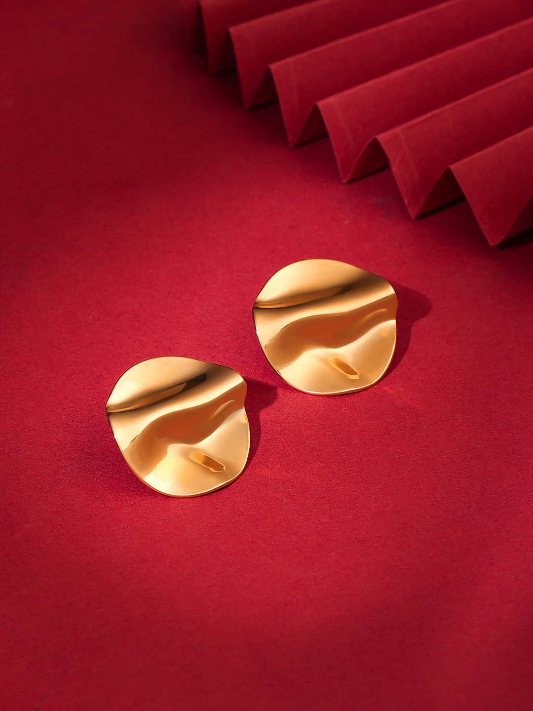 

Yellow Chimes Gold-Plated Studs Earrings Circular Shaped Earrings