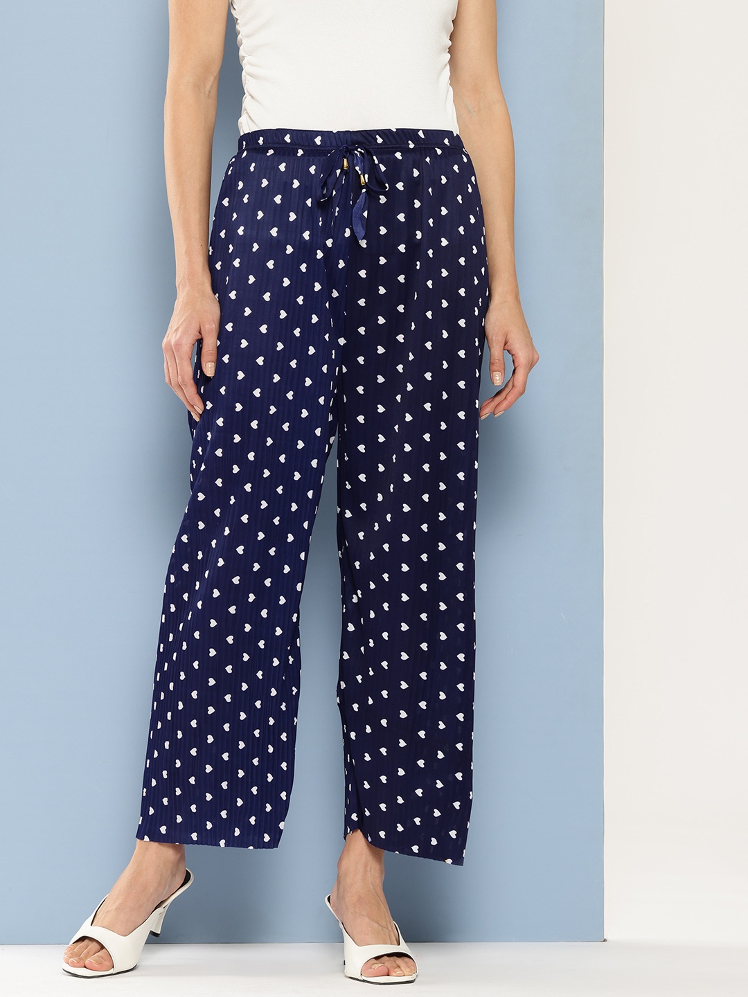 

Aarika Women Polka Dot Printed Flared Palazzos, Navy blue