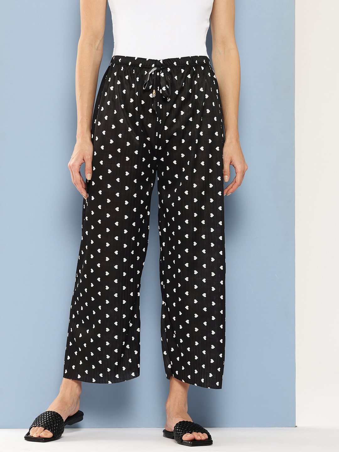 

Aarika Women Polka Dot Printed Flared Palazzos, Black