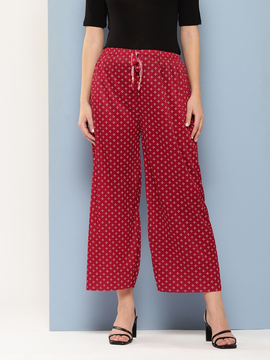 

Aarika Women Geometric Printed Flared Cropped Palazzos, Maroon