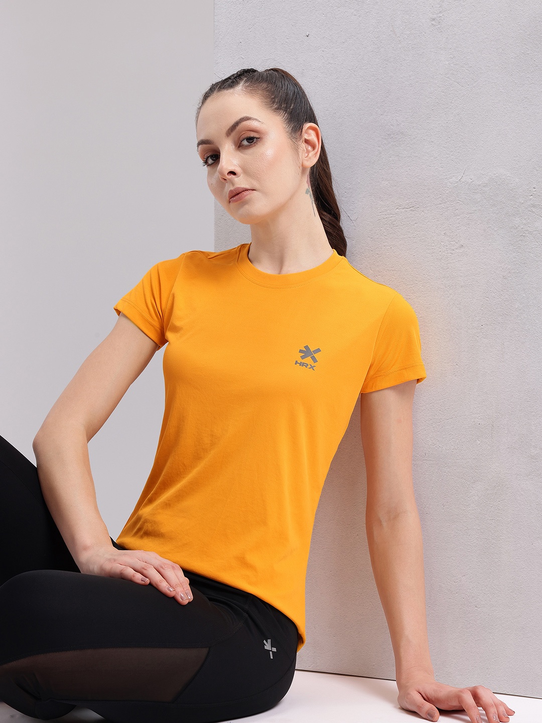 

HRX by Hrithik Roshan Solid T-shirt with Brand Logo Detail, Yellow