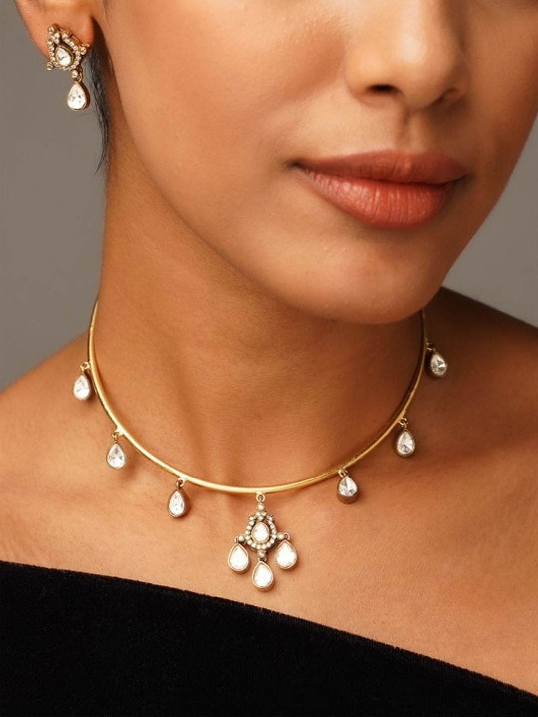 

ABDESIGNS Sophisticated Gold Plated Polki American Diamond Hasli Jewellery Set