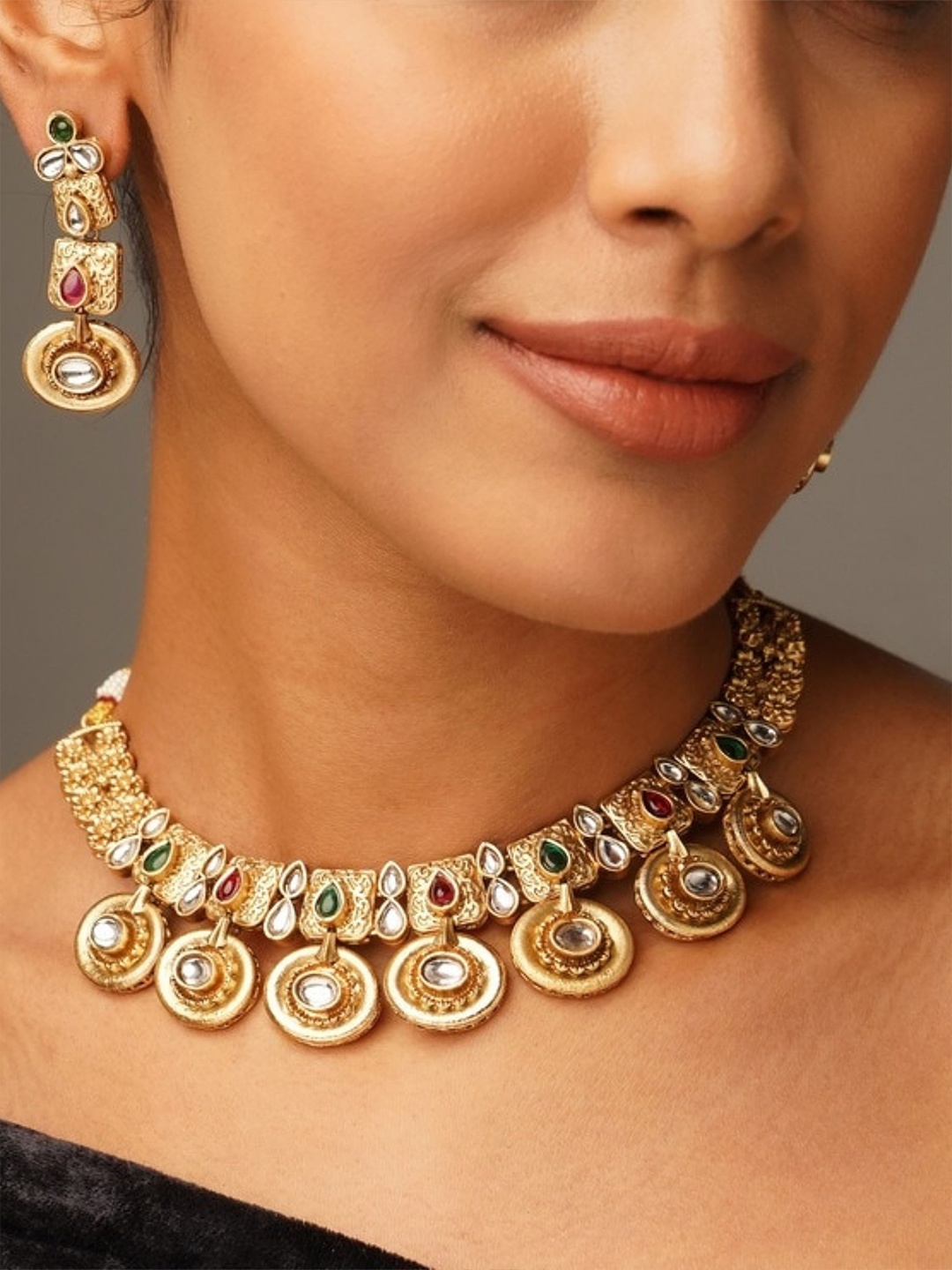 

ABDESIGNS Enchanting Gold Plated Kundan Antique Jewellery Set