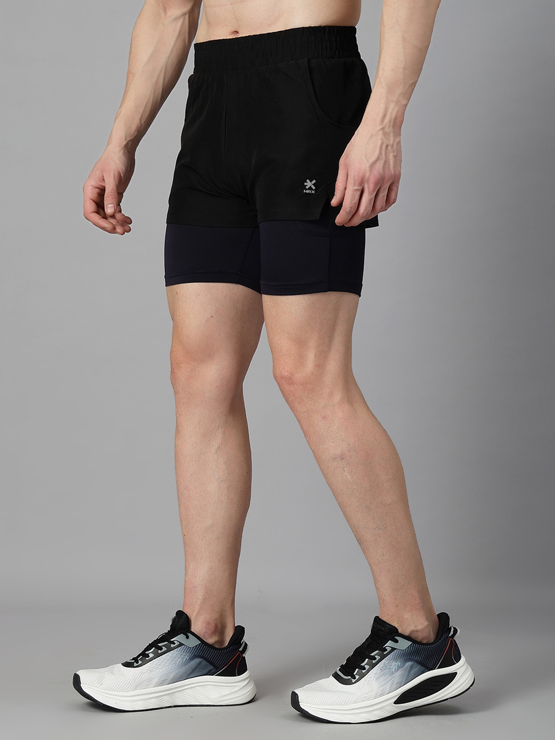 

HRX by Hrithik Roshan Men Solid Double Layered Regular Fit Sports Shorts, Black