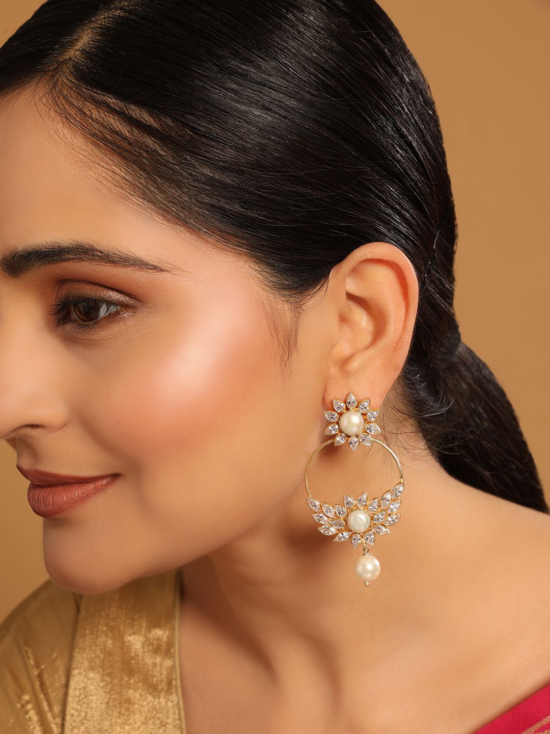 

Yinara 22K Gold Plated Kundan Studded Contemporary Shaped Drop Earrings