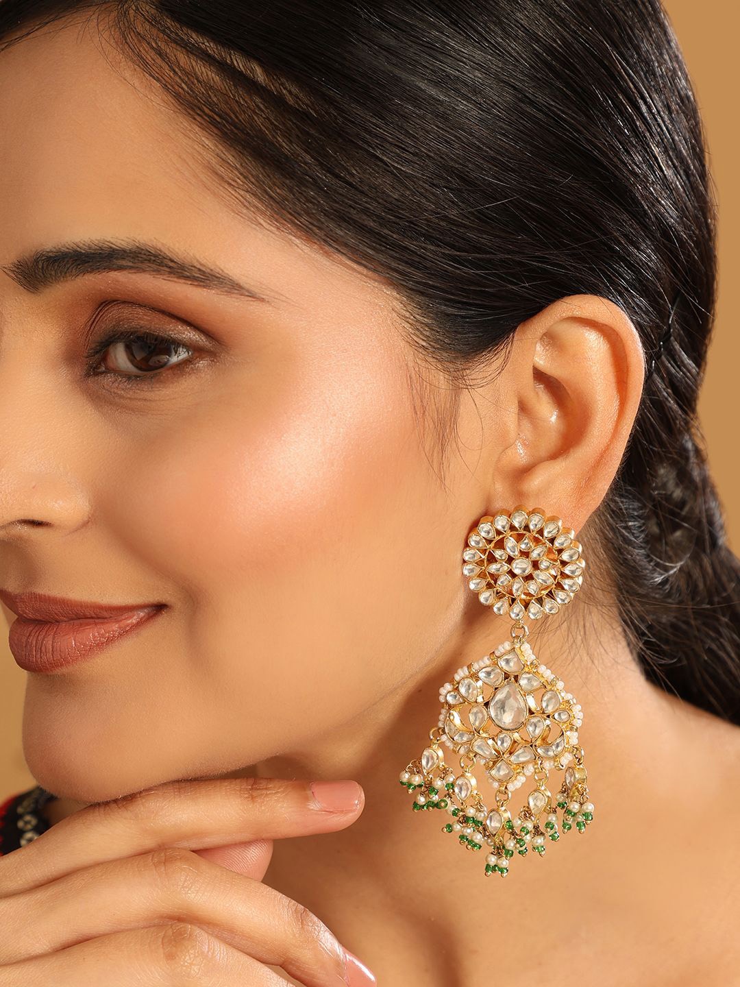 

Yinara 22K Gold Plated Kundan Studded Contemporary Shaped Drop Earrings