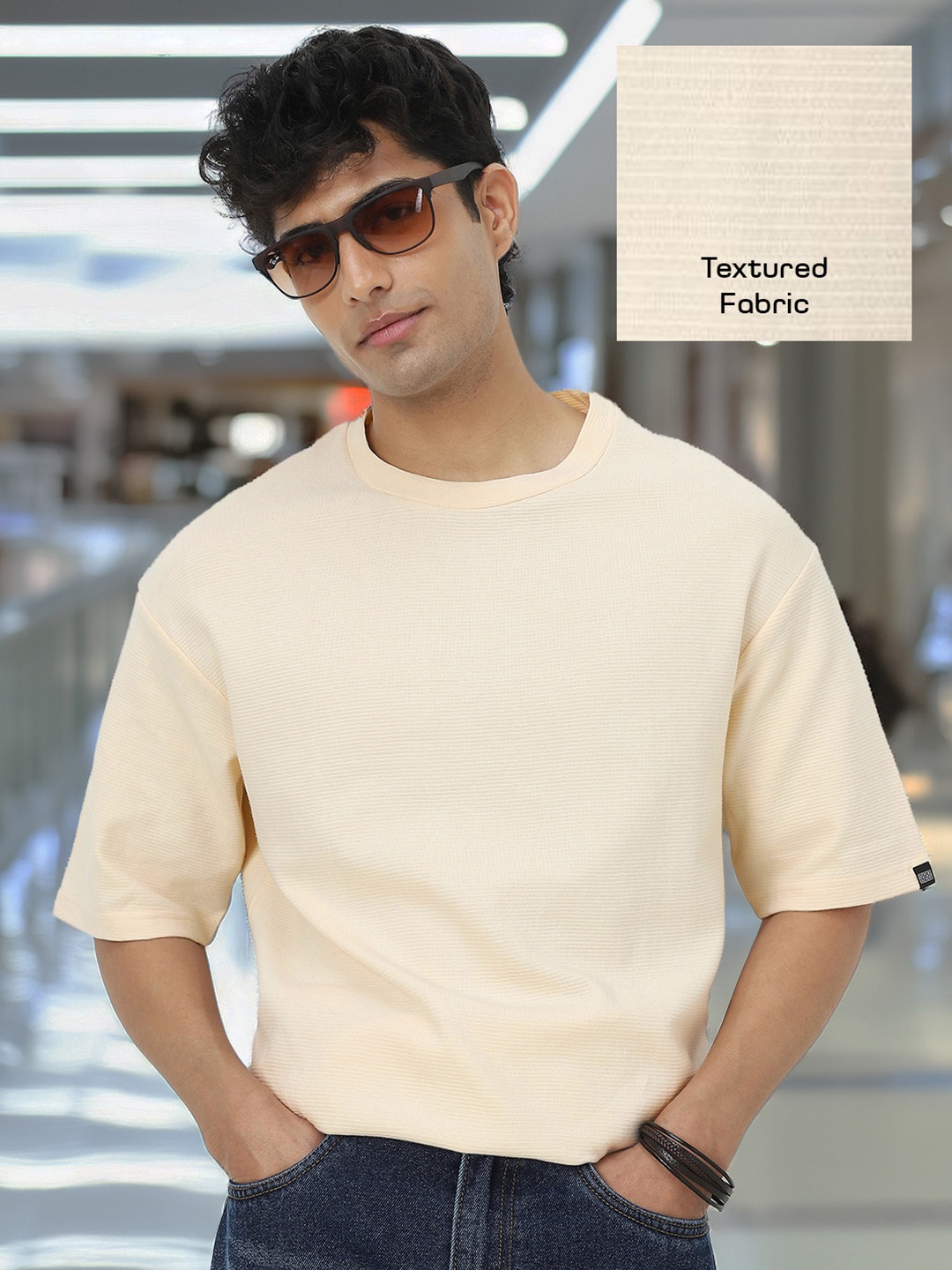 

Urbano Fashion Men Textured Round Neck Oversized Half Sleeve Cotton T-Shirt, Cream