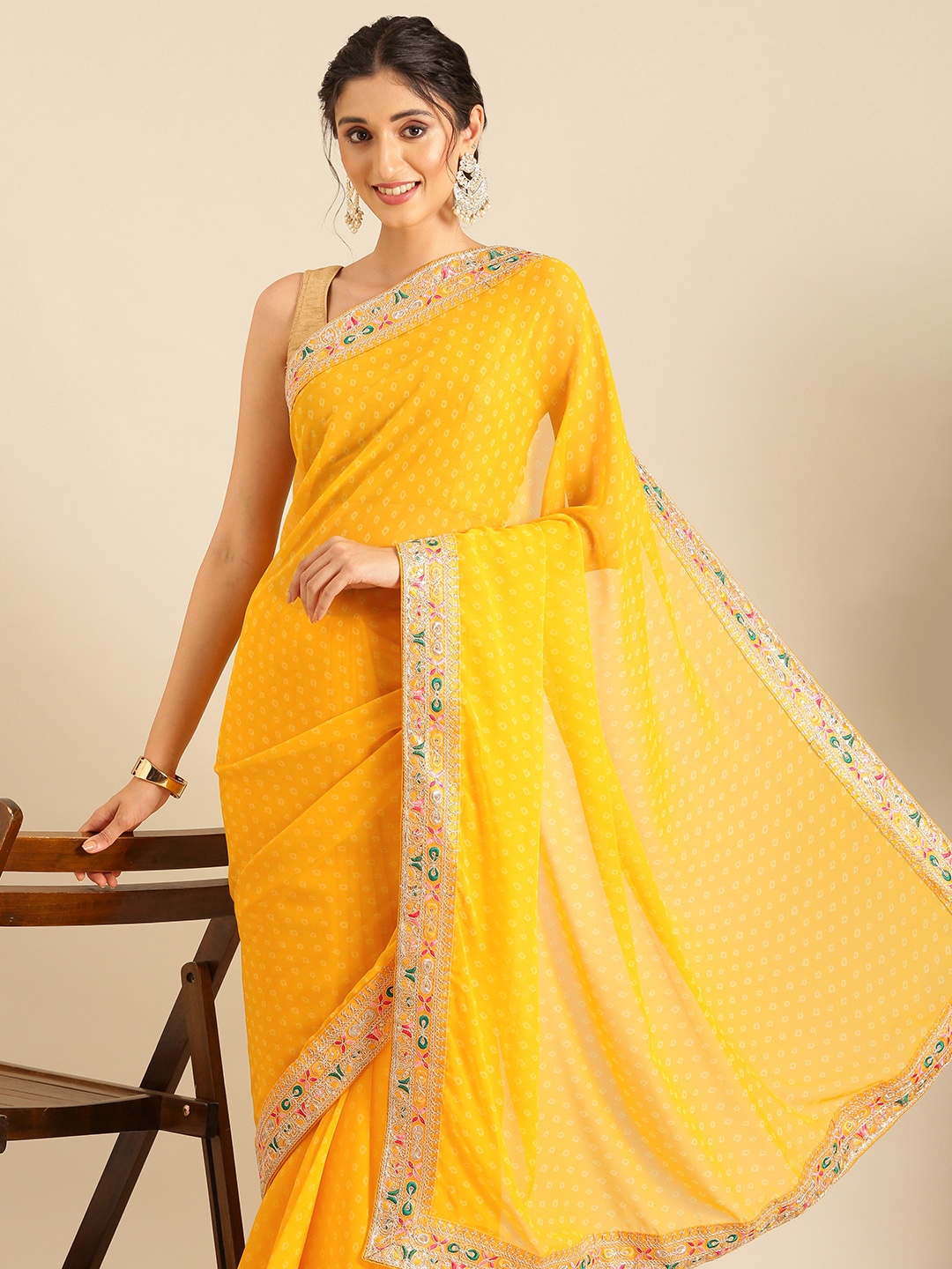 

Mitera Bandhani Printed Saree with Embroidered Detail, Yellow