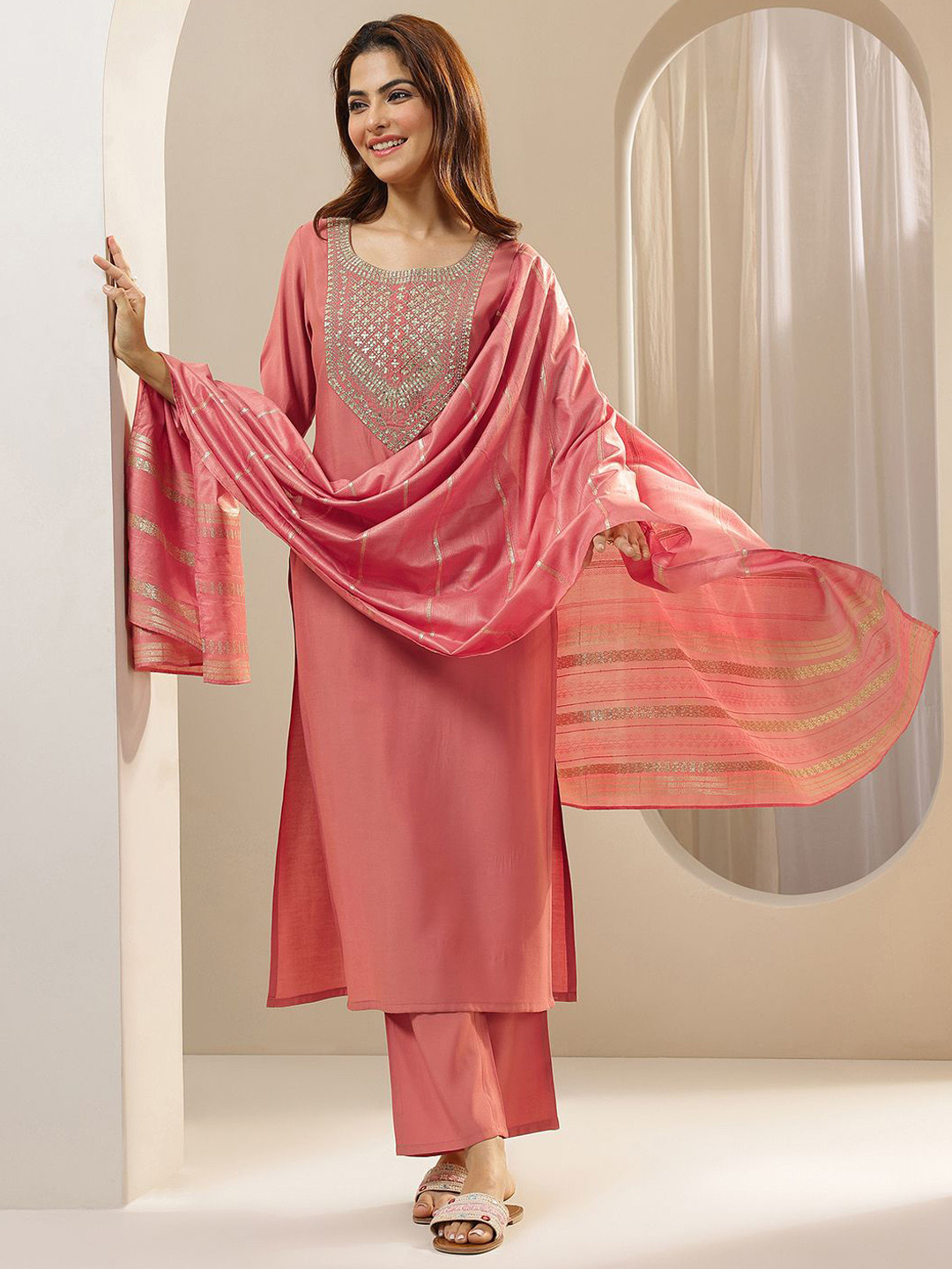 

Libas Women Ethnic Motifs Yoke Design Regular Sequinned Kurta with Trousers & With Dupatta, Peach