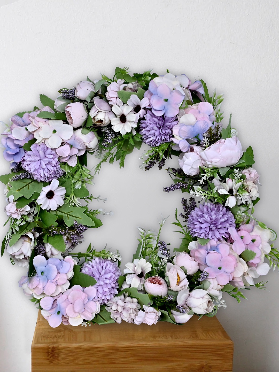 

Myntra Elegant Homes Green & Purple Artificial Flower Ring