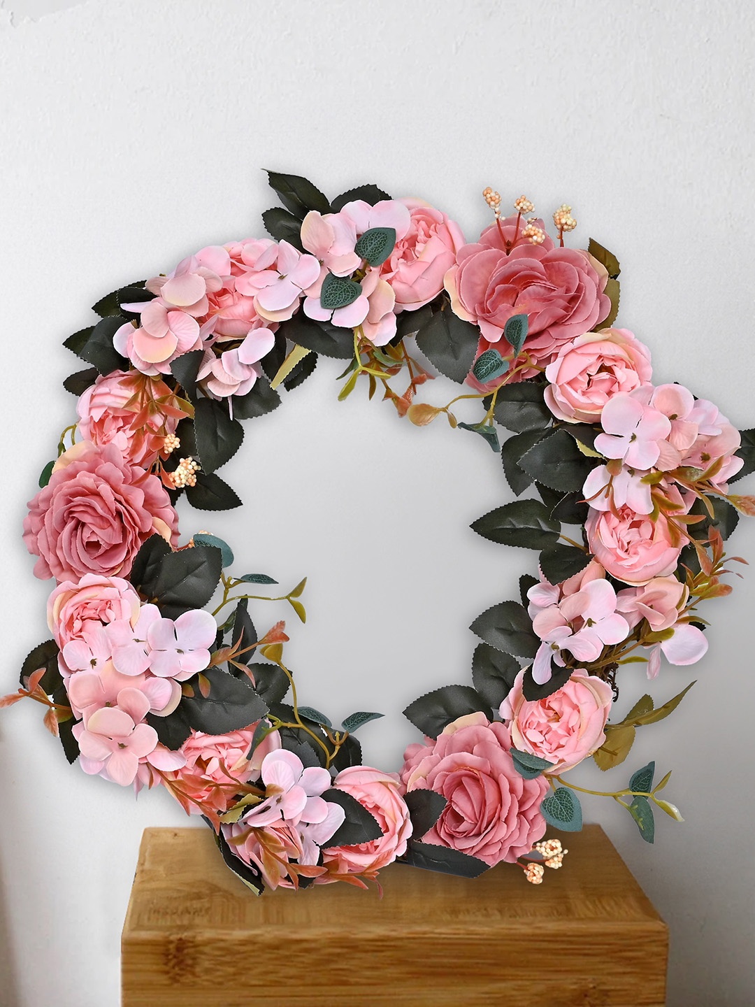 

Myntra Elegant Homes Pink & Green Artificial Flower Ring