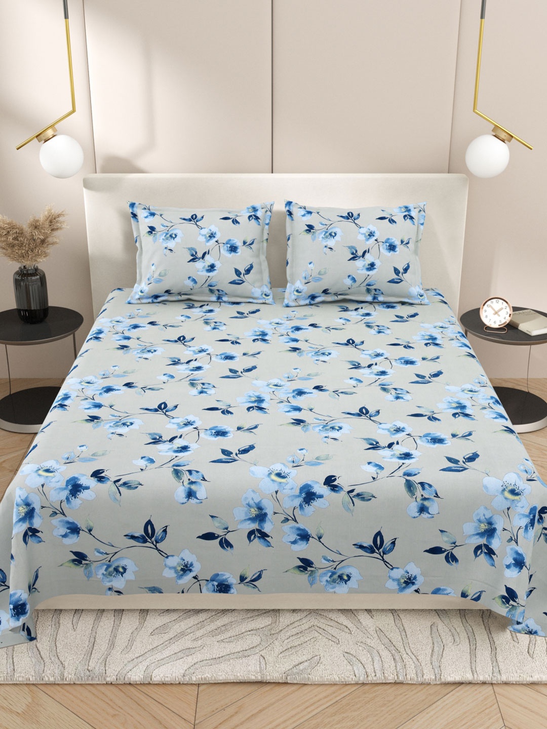

Myntra Elegant Homes Grey & Blue Floral 220 TC King Bedsheet with 2 Pillow Covers