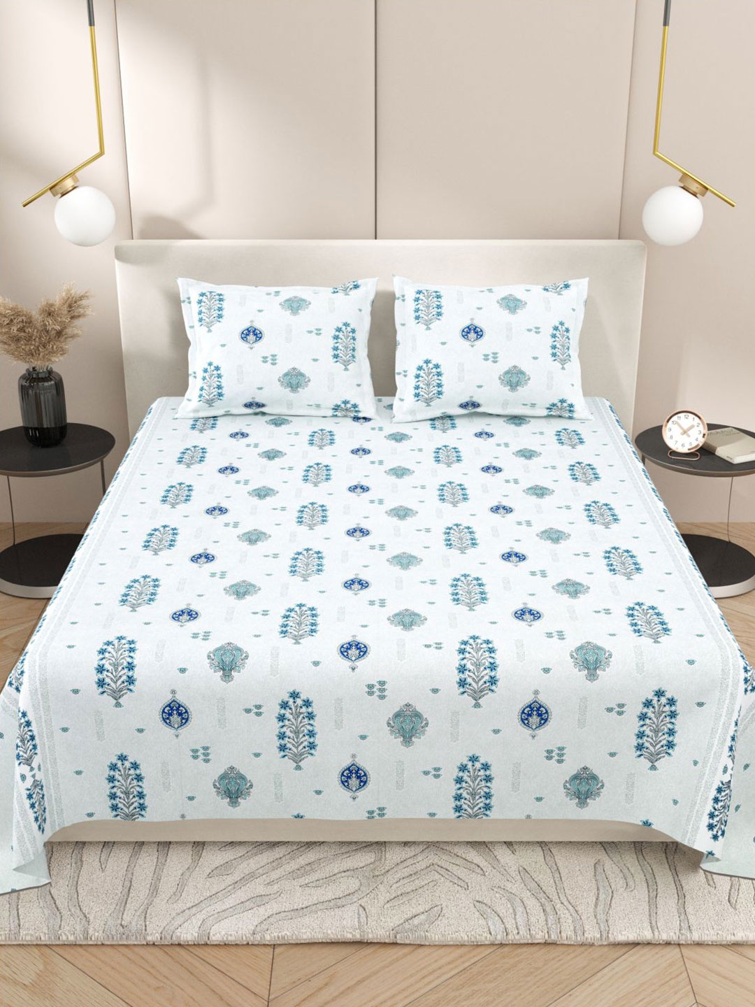 

Myntra Elegant Homes White & Blue Floral 220 TC King Bedsheet with 2 Pillow Covers