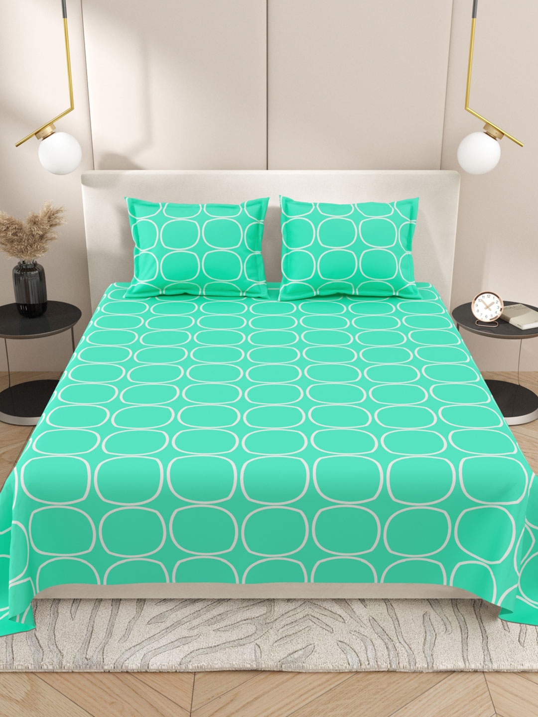 

Myntra Elegant Homes Turquoise Blue & White Geometric 220 TC King Bedsheet with 2 Pillow Covers