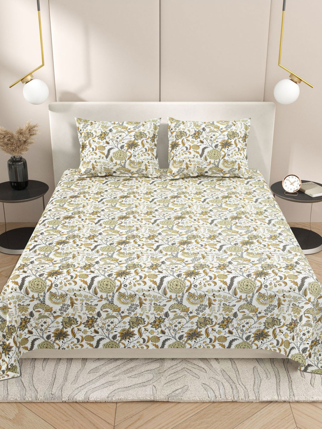 

Myntra Elegant Homes White & Grey Floral 220 TC King Bedsheet with 2 Pillow Covers