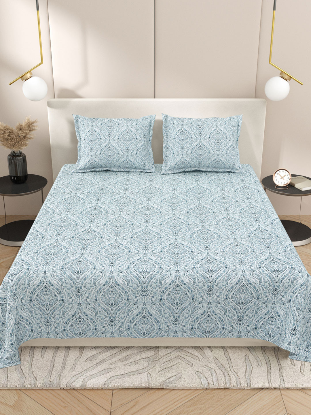 

Myntra Elegant Homes White & Turquoise Blue Ethnic Motifs 220 TC King Bedsheet with 2 Pillow Covers