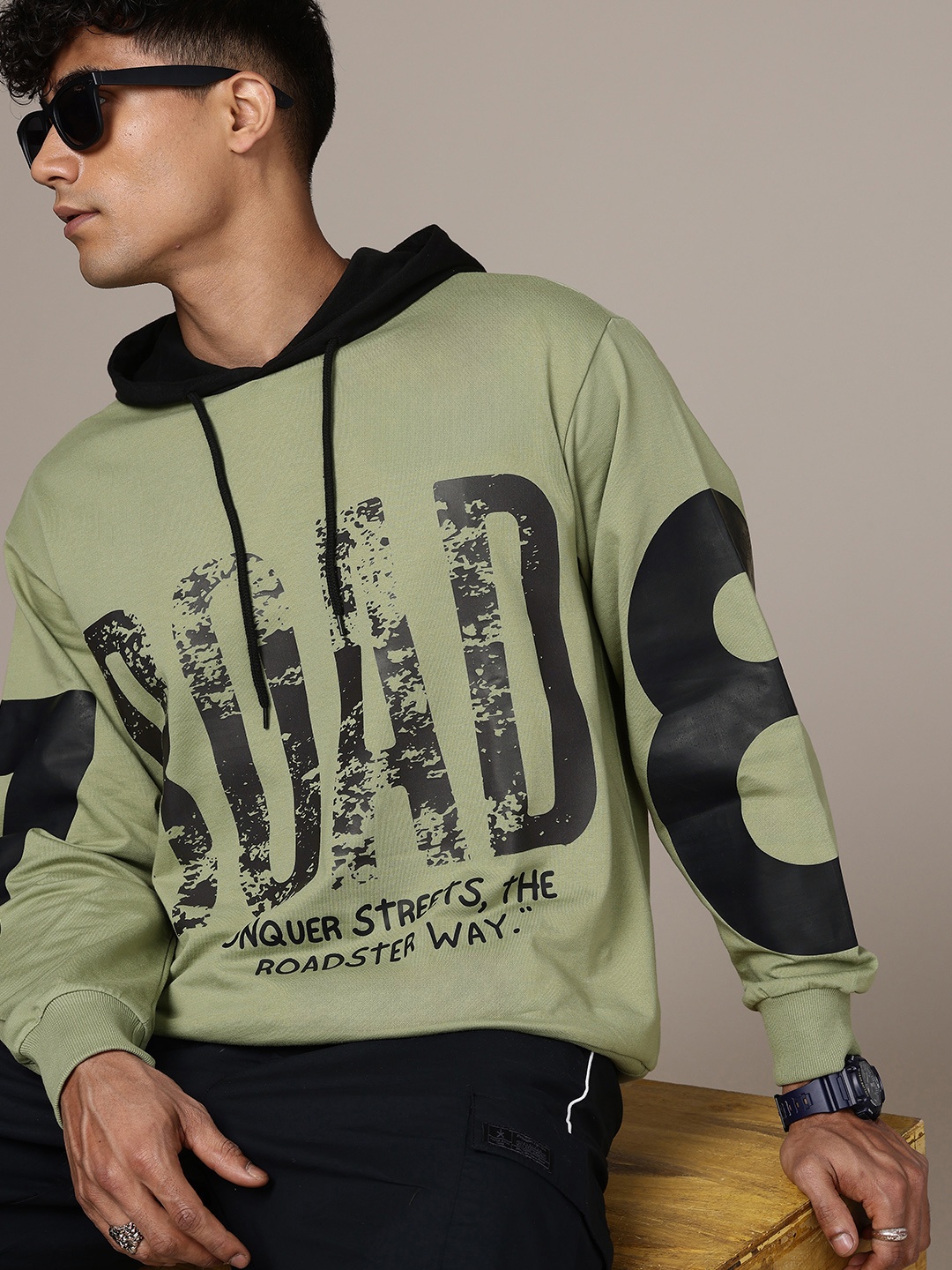 

The Roadster Lifestyle Co. Men Printed Hooded Pure Cotton Sweatshirt, Olive