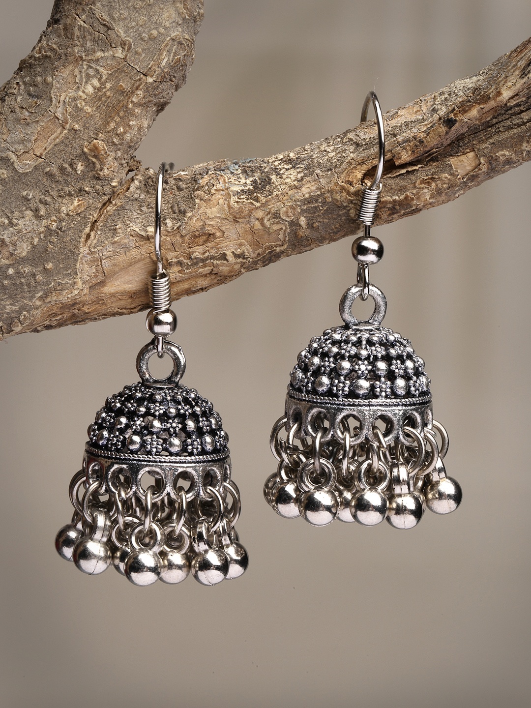 

Anouk Women Silver-Toned German Silver Oxidised Dome Shaped Jhumka Earrings