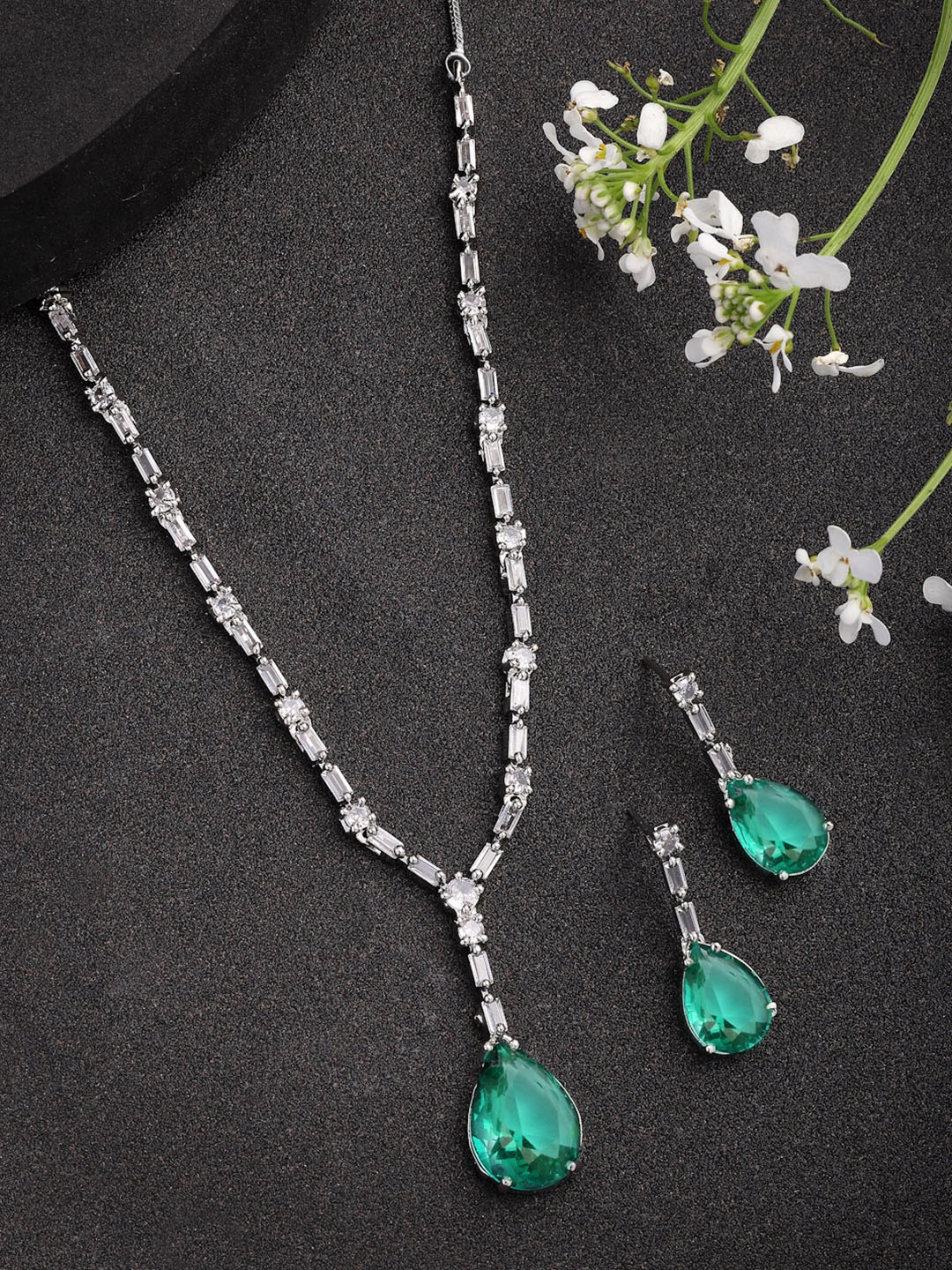 

Anouk Women Silver Plated Green American Diamond Studded Jewellery Set