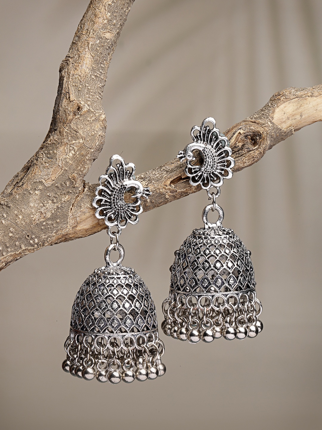

Anouk Women Silver-Toned Peacock Design German Silver Oxidised Dome Shaped Jhumka Earrings
