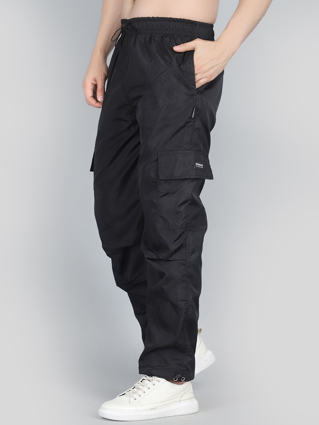 

Raxedo Men Relaxed Fit Baggy Parachute Track Pant, Black