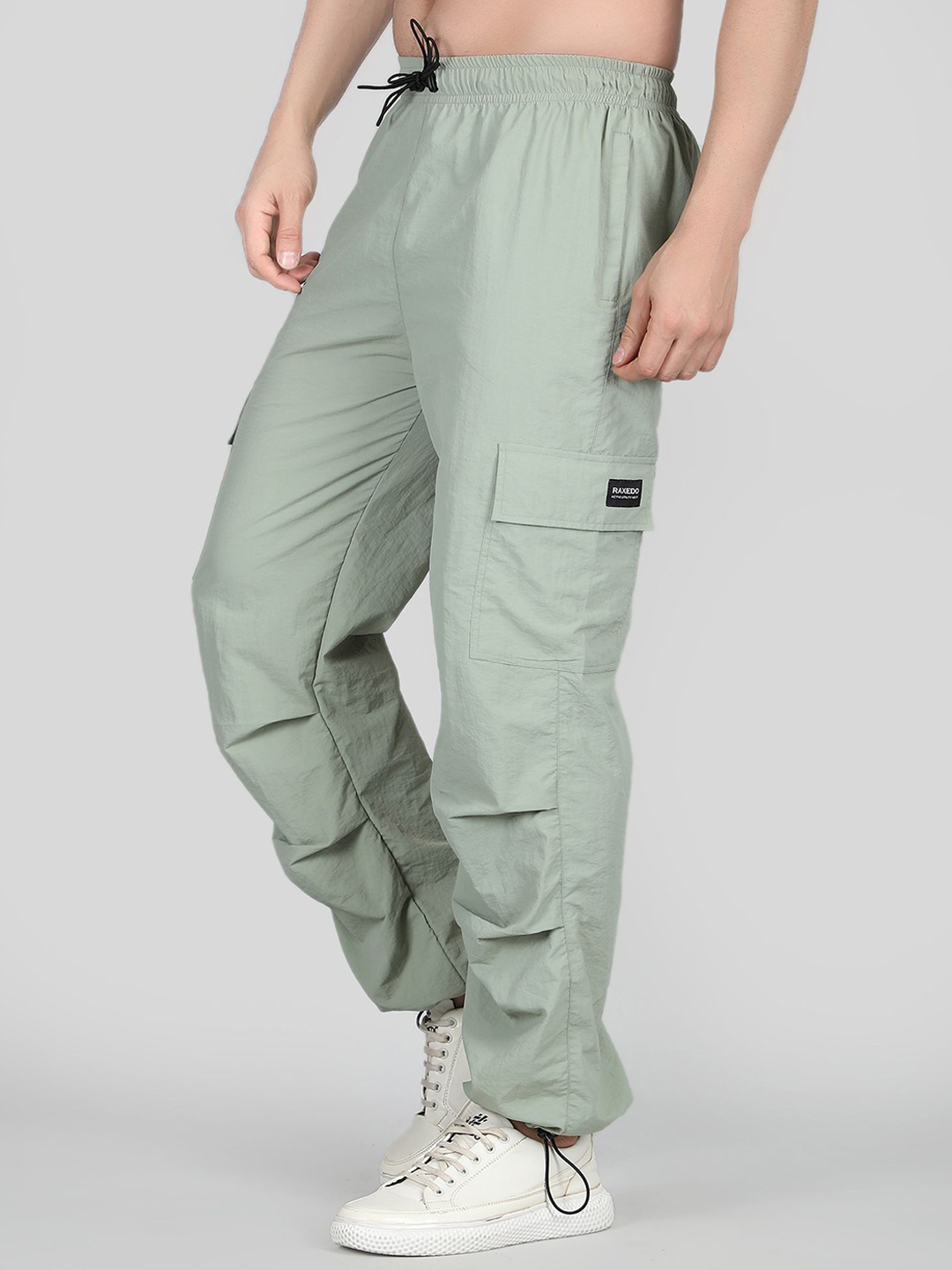 

Raxedo Men Relaxed Fit Baggy Parachute Track Pants, Green