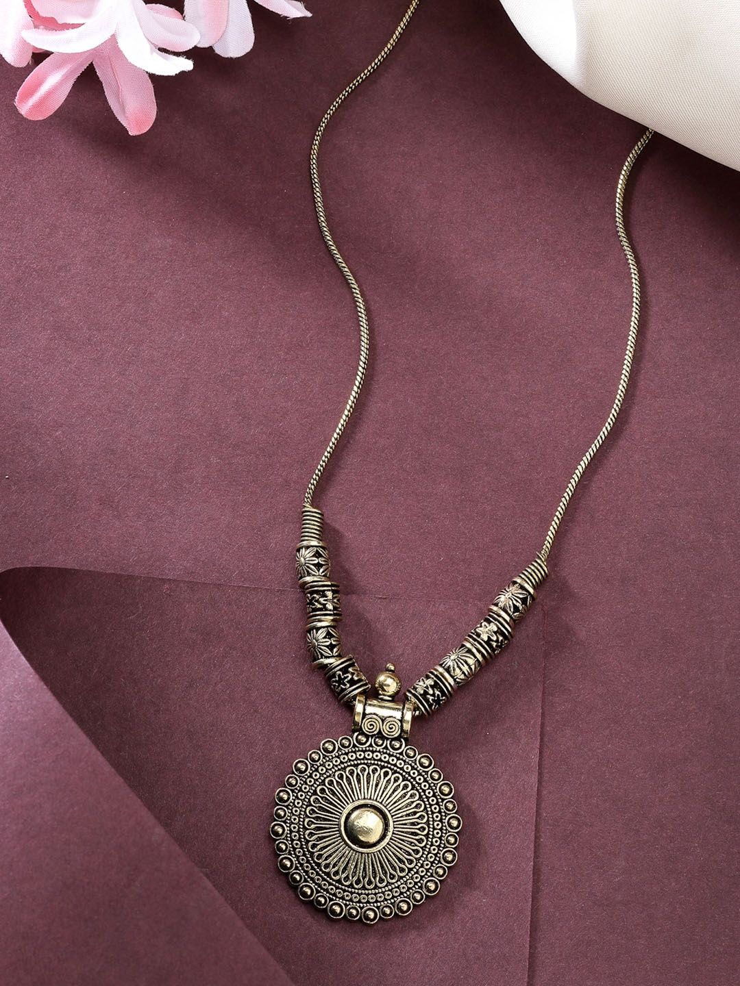 

Anouk Women Gold-Plated Circular Shape Pendant with Chain