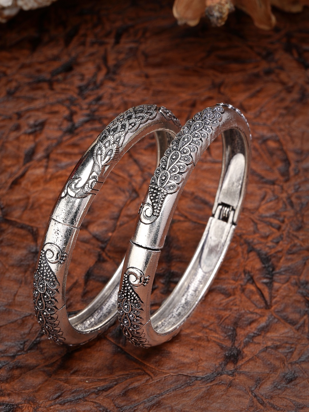 

Anouk Women Silver-Toned German Silver Peacock Design Oxidised Kada Bangles