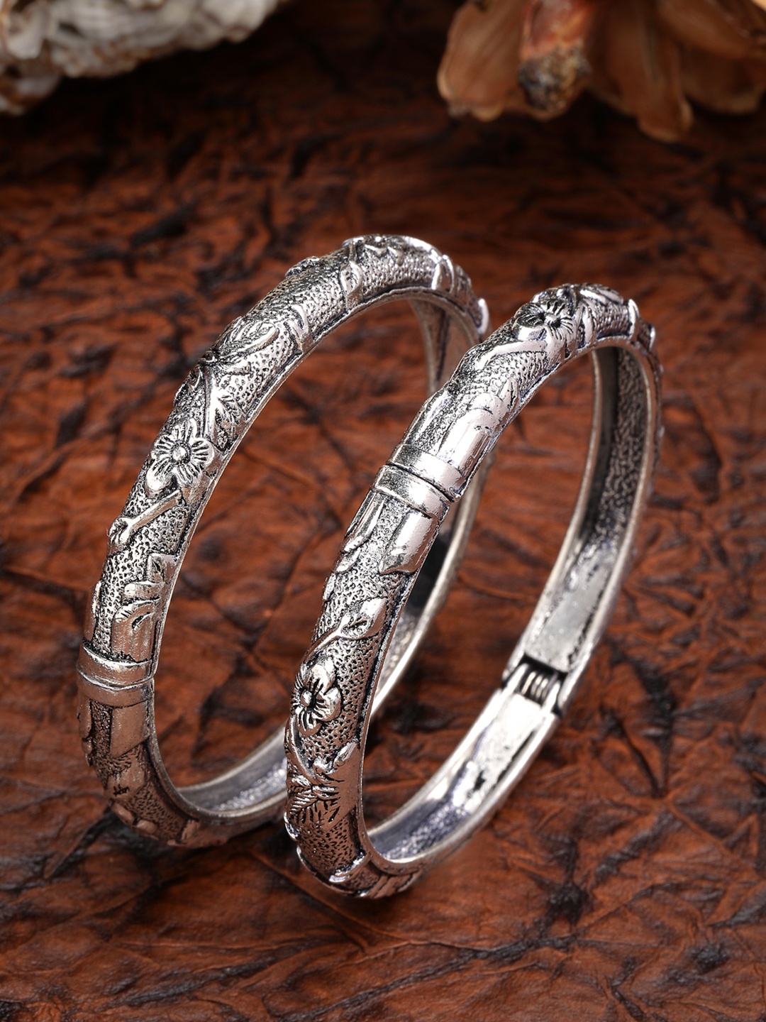 

Anouk Women Set of 2 Silver-Toned German Silver Floral Oxidised Kada Bangles