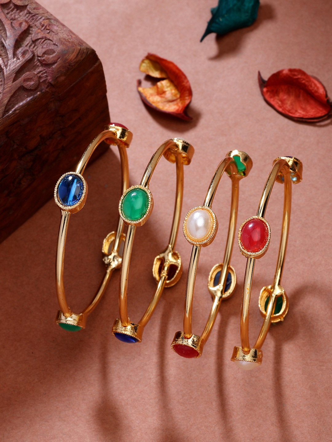 

Anouk Women Set of 4 Gold-Plated Artificial Stone Studded Bangles