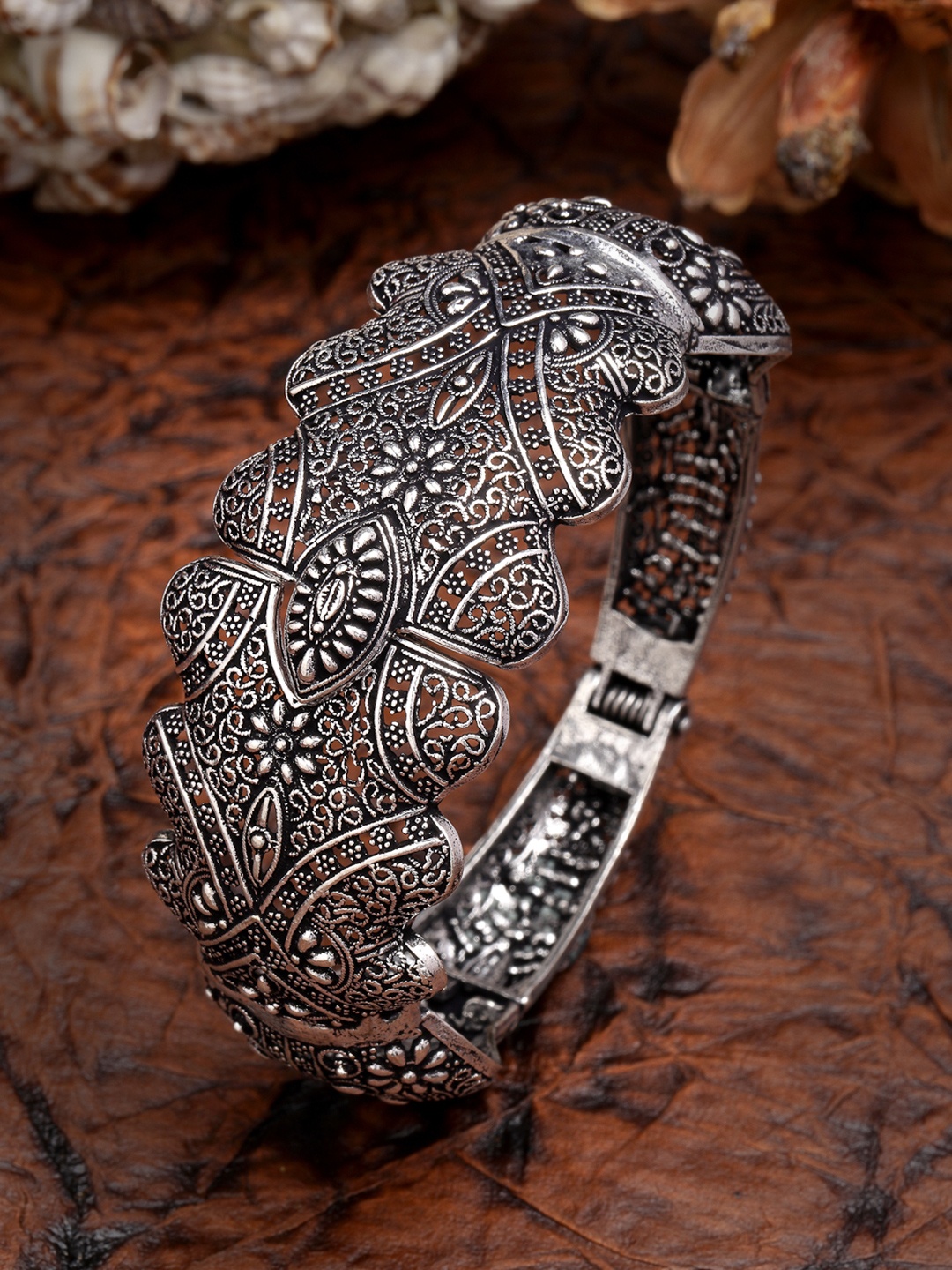 

Anouk Women Silver Toned German Silver Oxidised Kada Bangle