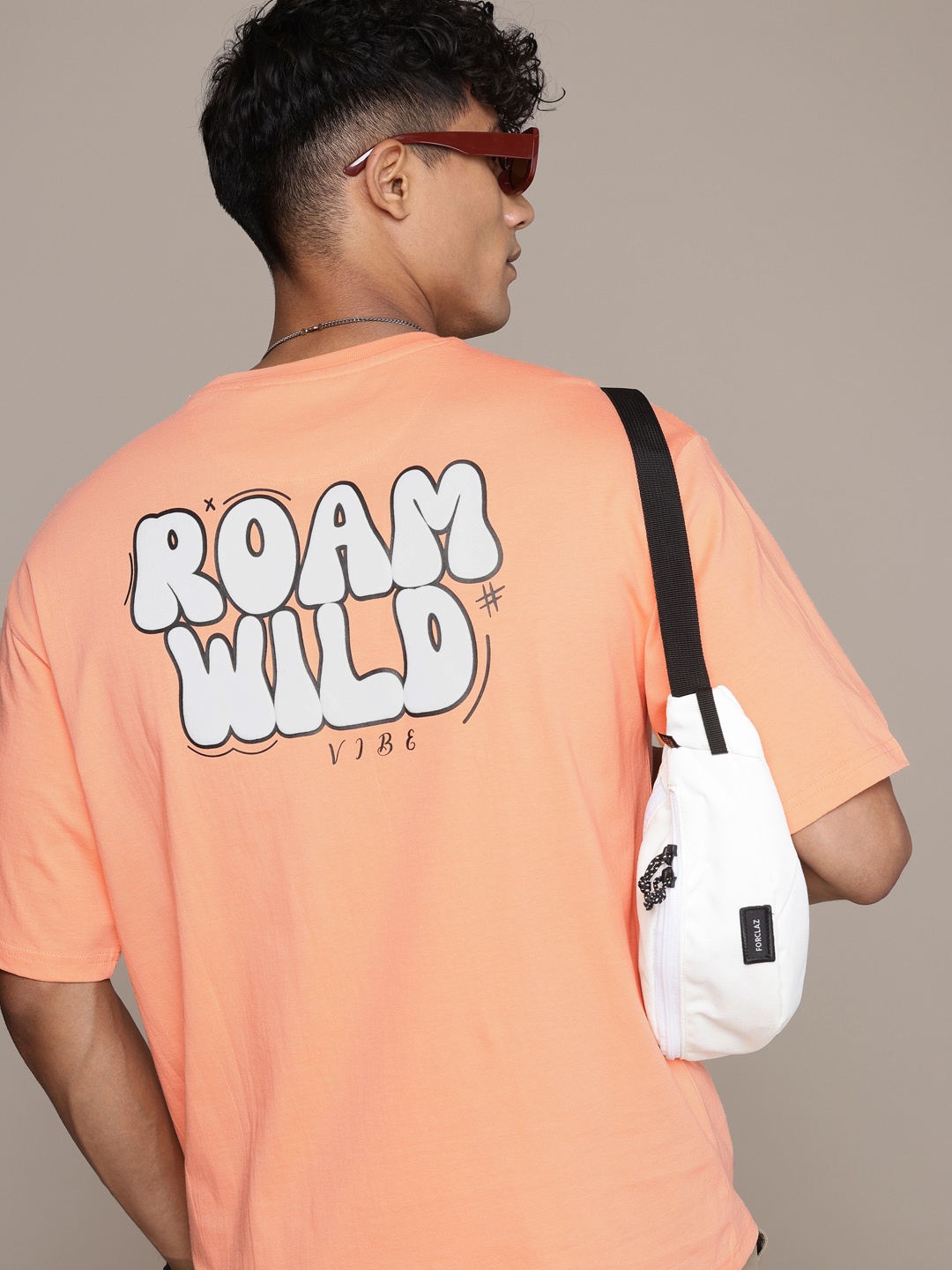 

The Roadster Lifestyle Co. Printed Drop-Shoulder Sleeves Relaxed Fit Pure Cotton T-shirt, Orange