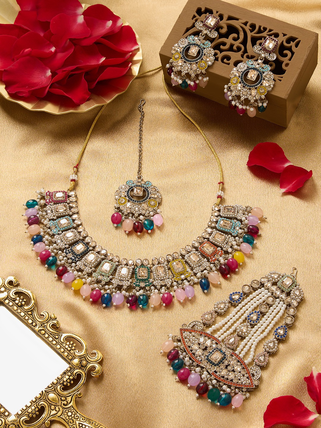 

Zaveri Pearls Gold Plated Stone Studded & Beaded Jewellery Set