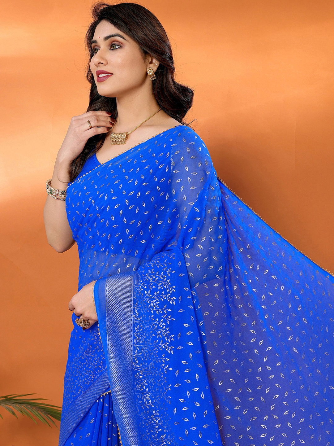 

Mitera Floral Woven Design Zari Georgette Saree With Unstitched Blouse Piece, Blue