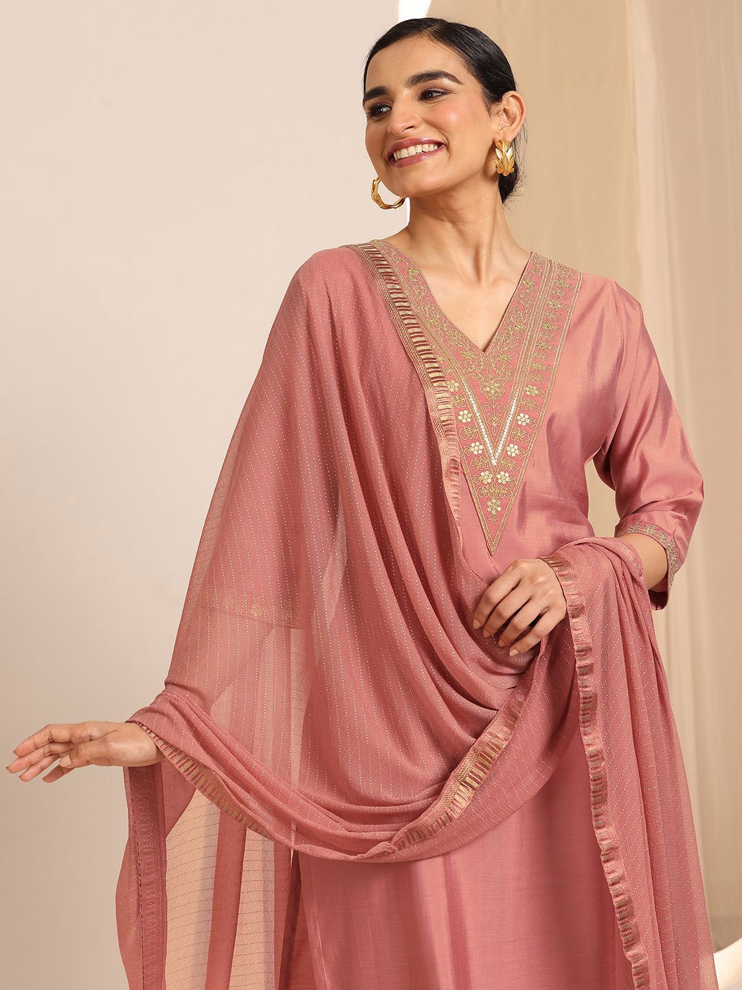 

Libas Floral Yoke Design Sequinned V-Neck Straight Kurta With Trousers And Dupatta, Peach