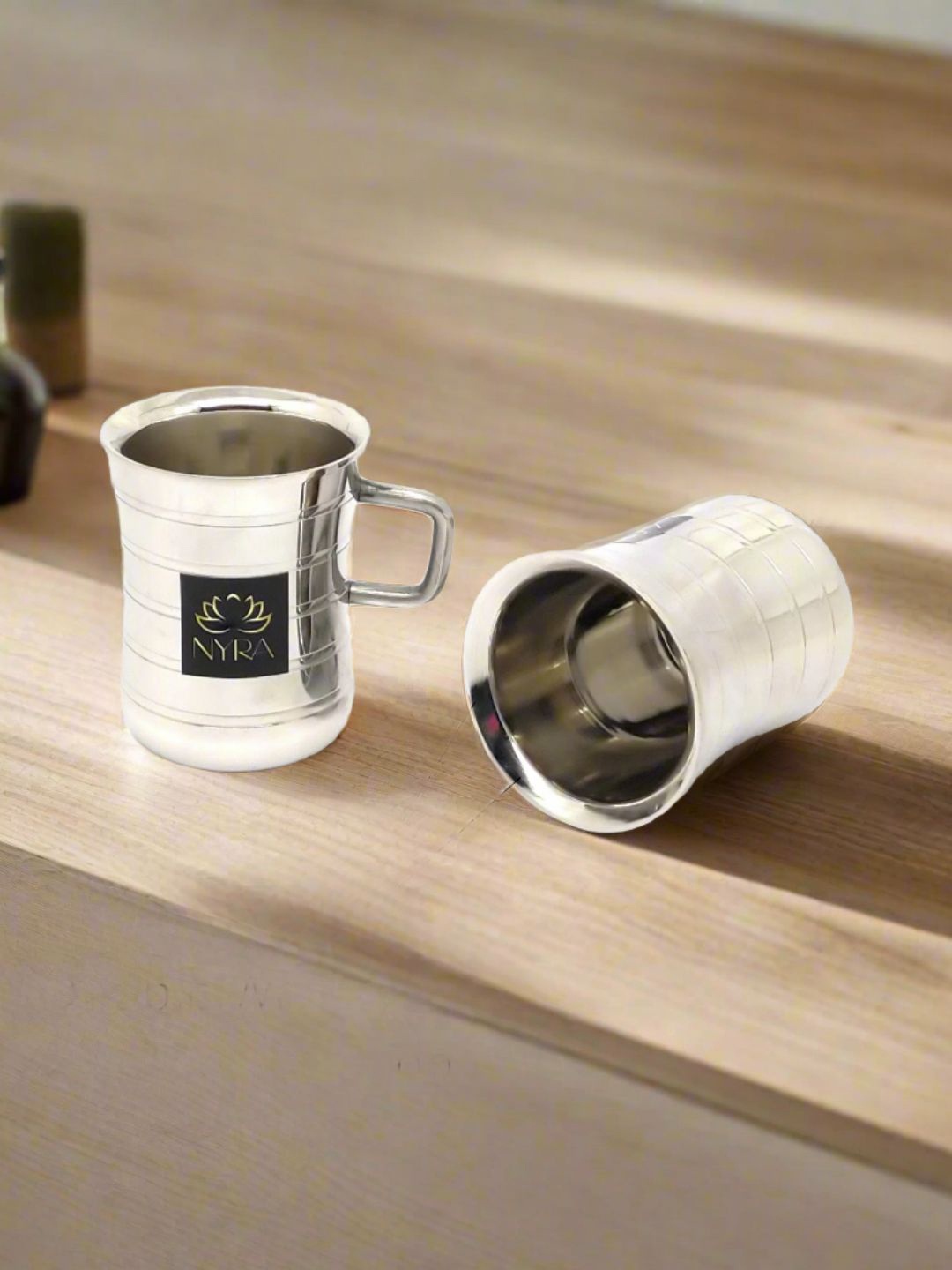 

Nyra Kitchenware Steel & Black 2 Pieces Textured Stainless Steel Glossy Cups-100 ml Each
