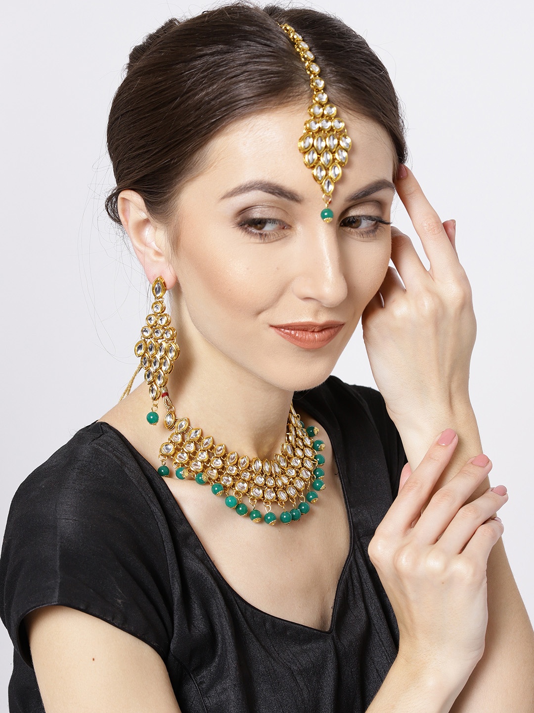 

Priyaasi Gold-Toned & Green Kundan Jewellery Set