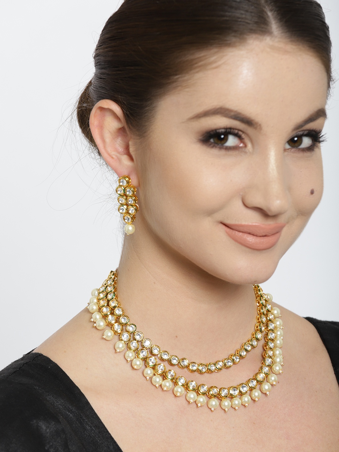 

Jewels Galaxy Gold-Toned Dual-Stranded Kundan Jewellery Set